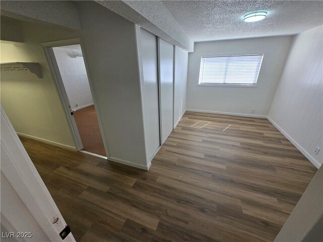4754 Marnell Dr, Las Vegas, NV 89121 - interior space featuring wood finished floors, a textured ceiling, and a closet