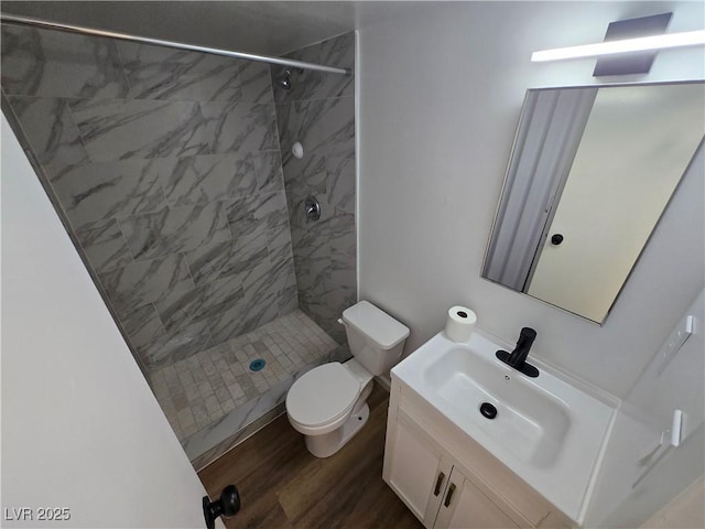 4754 Marnell Dr, Las Vegas, NV 89121 - bathroom with a shower stall, toilet, vanity, and wood finished floors