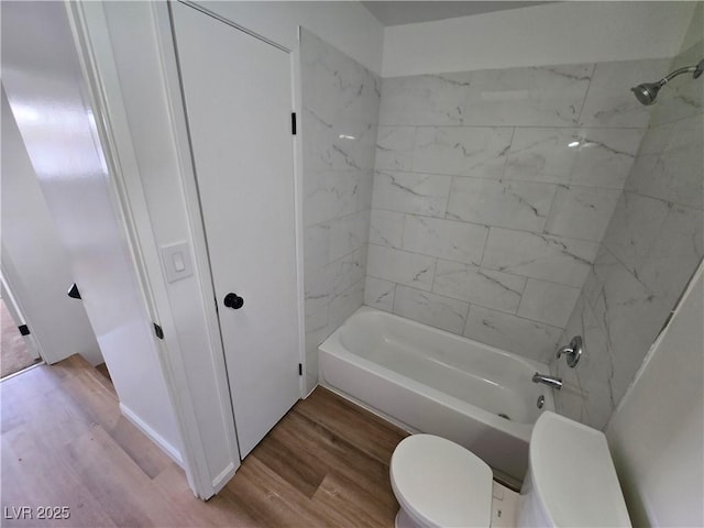 4754 Marnell Dr, Las Vegas, NV 89121 - full bath featuring shower / bath combination, wood finished floors, and toilet