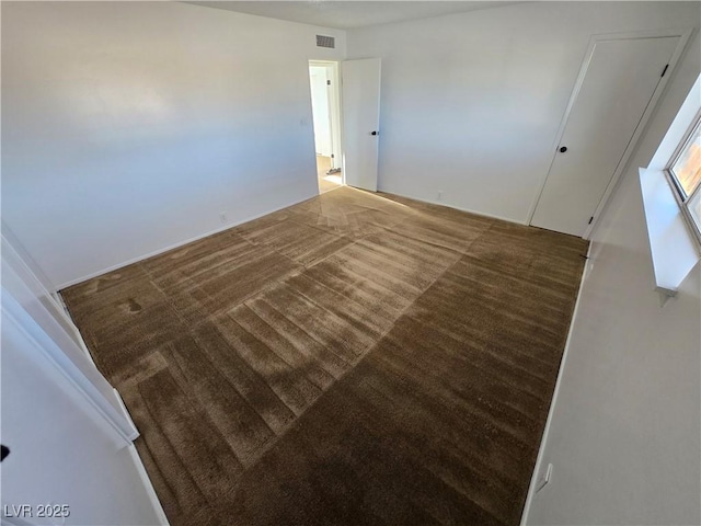4754 Marnell Dr, Las Vegas, NV 89121 - unfurnished bedroom featuring visible vents and carpet flooring