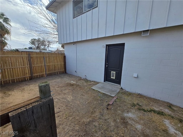 4754 Marnell Dr, Las Vegas, NV 89121 - doorway to property with fence and board and batten siding