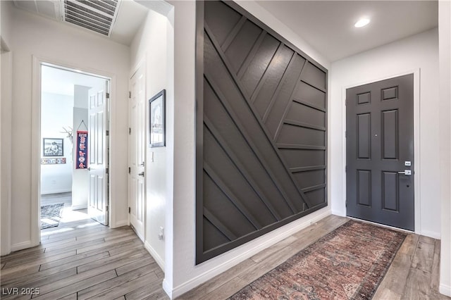 doorway to property with visible vents