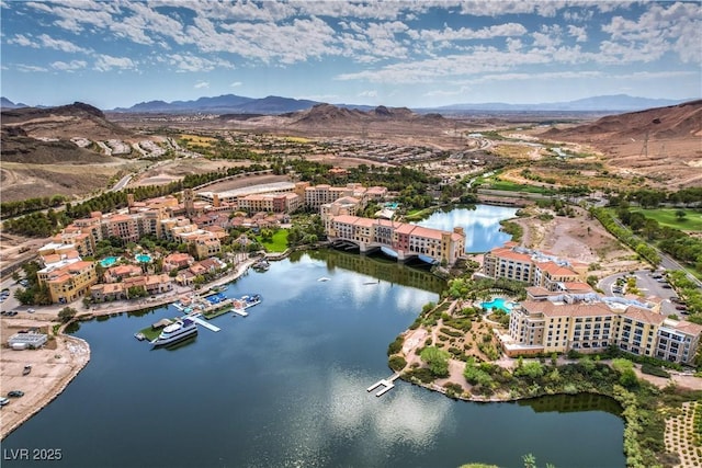 aerial view with a water and mountain view