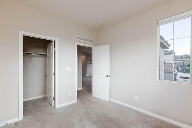 26 Lilla Rosa St, Henderson, NV 89011 - unfurnished bedroom with visible vents, a closet, baseboards, and carpet floors