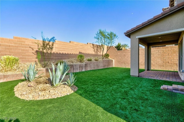 26 Lilla Rosa St, Henderson, NV 89011 - view of yard with a fenced backyard and a patio area