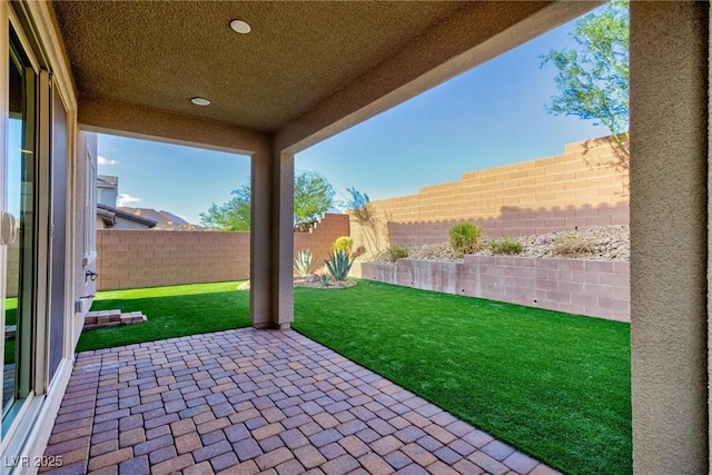 26 Lilla Rosa St, Henderson, NV 89011 - view of patio / terrace with a fenced backyard