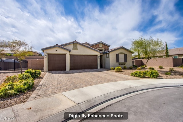 10470 Irish Cliffs Ct, Las Vegas, NV 89149 - view of front of house with stucco siding, fence, decorative driveway, a garage, and a tile roof
