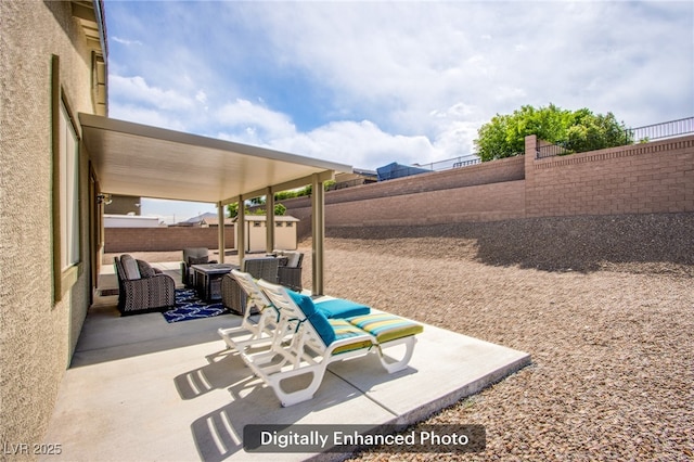 10470 Irish Cliffs Ct, Las Vegas, NV 89149 - view of patio featuring an outdoor structure, outdoor lounge area, a shed, and a fenced backyard