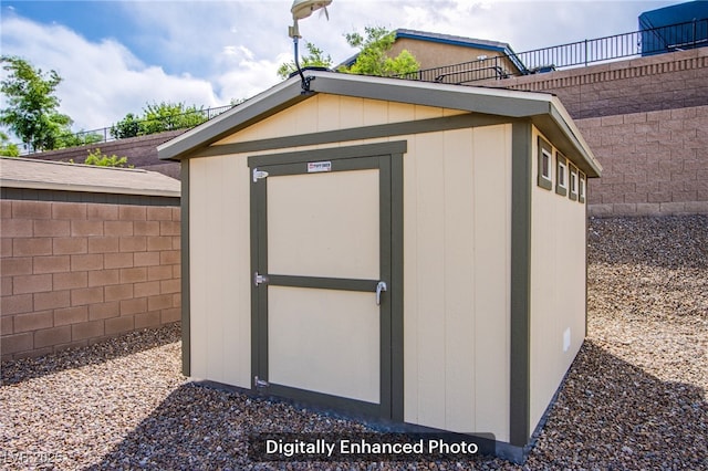 10470 Irish Cliffs Ct, Las Vegas, NV 89149 - view of shed featuring fence