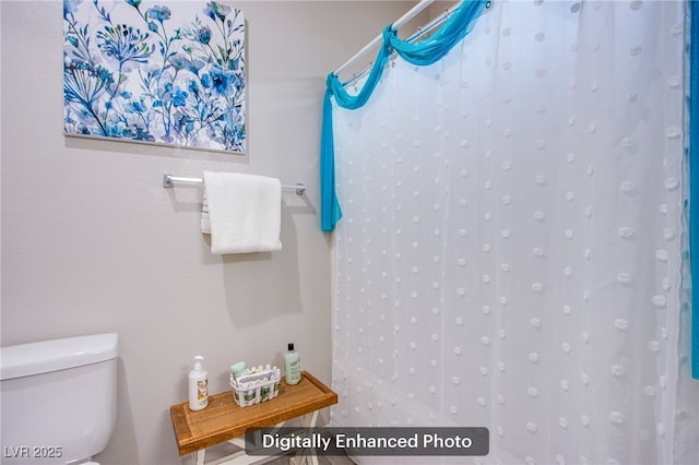 10470 Irish Cliffs Ct, Las Vegas, NV 89149 - bathroom featuring toilet and a shower with curtain