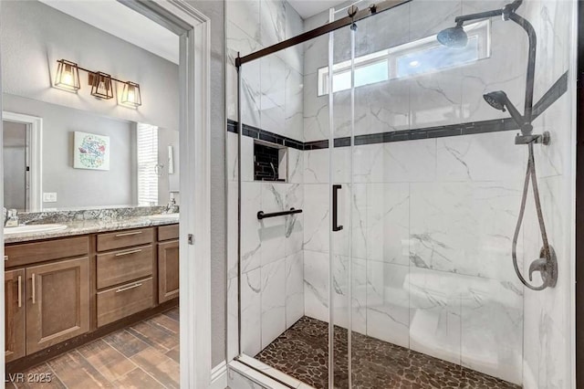 7360 Southern Magnolia St, Las Vegas, NV 89149 - full bath featuring a marble finish shower, double vanity, and a sink