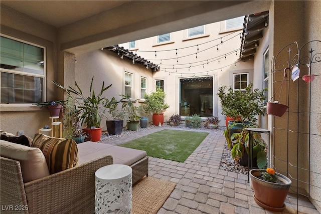view of yard featuring outdoor lounge area and a patio area