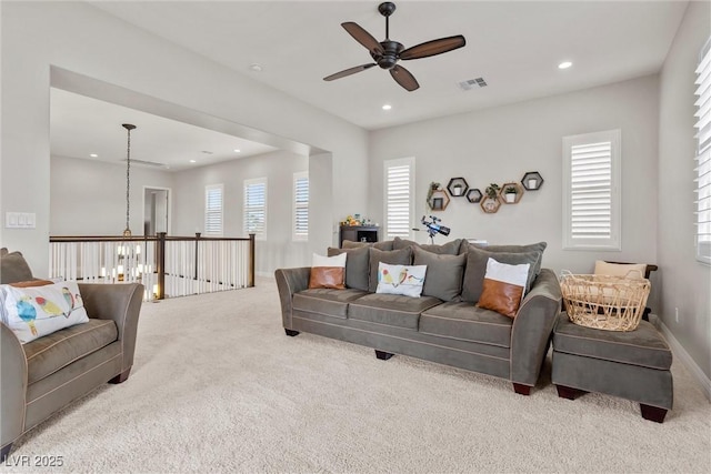 carpeted living area featuring visible vents, recessed lighting, and ceiling fan