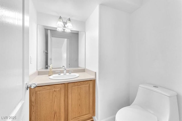 5060 Blue Rose St, North Las Vegas, NV 89081 - bathroom featuring toilet and vanity