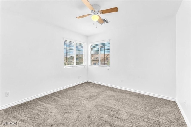 5060 Blue Rose St, North Las Vegas, NV 89081 - empty room with carpet, visible vents, a ceiling fan, and baseboards