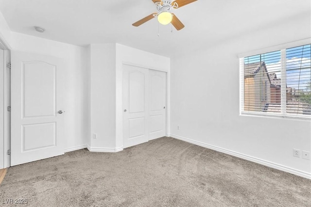 5060 Blue Rose St, North Las Vegas, NV 89081 - unfurnished bedroom featuring carpet, a closet, a ceiling fan, and baseboards