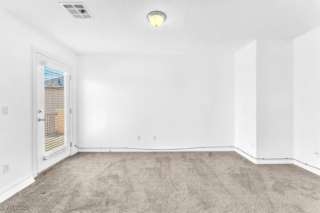 5060 Blue Rose St, North Las Vegas, NV 89081 - carpeted empty room with baseboards and visible vents