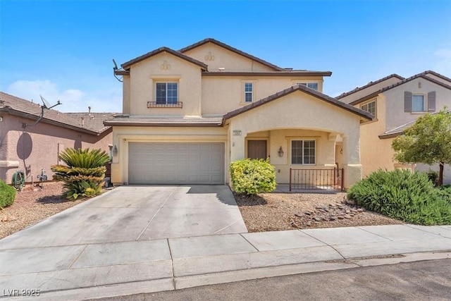 5060 Blue Rose St, North Las Vegas, NV 89081 - traditional home with a garage, concrete driveway, a tiled roof, and stucco siding