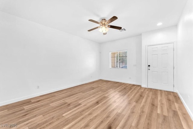 5060 Blue Rose St, North Las Vegas, NV 89081 - unfurnished room with visible vents, baseboards, recessed lighting, light wood-style floors, and ceiling fan