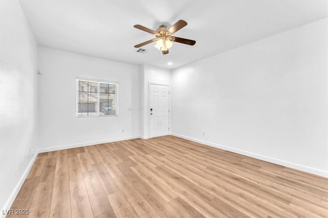 5060 Blue Rose St, North Las Vegas, NV 89081 - spare room with baseboards, visible vents, light wood-style floors, and ceiling fan