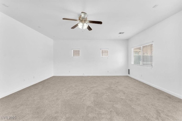 5060 Blue Rose St, North Las Vegas, NV 89081 - spare room featuring visible vents, carpet flooring, and ceiling fan