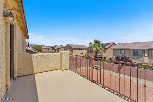 5060 Blue Rose St, North Las Vegas, NV 89081 - view of patio / terrace featuring a balcony and a residential view