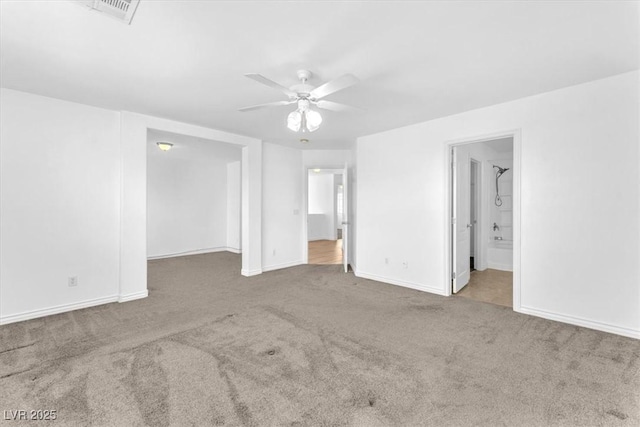 5060 Blue Rose St, North Las Vegas, NV 89081 - unfurnished bedroom with carpet flooring, ensuite bathroom, visible vents, baseboards, and a ceiling fan