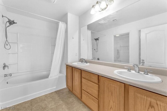 5060 Blue Rose St, North Las Vegas, NV 89081 - full bath with double vanity, shower / bathtub combination with curtain, tile patterned floors, and a sink