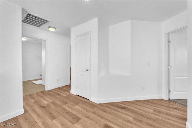 5060 Blue Rose St, North Las Vegas, NV 89081 - empty room featuring light wood-style floors, visible vents, and baseboards