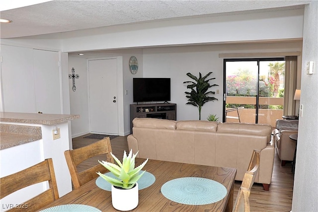 dining area featuring wood finished floors