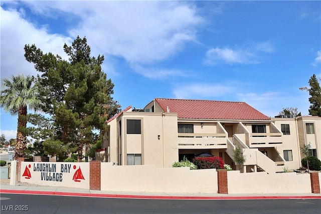 3740 Desert Marina Dr Unit 11, Laughlin, NV 89029 - view of building exterior with fence
