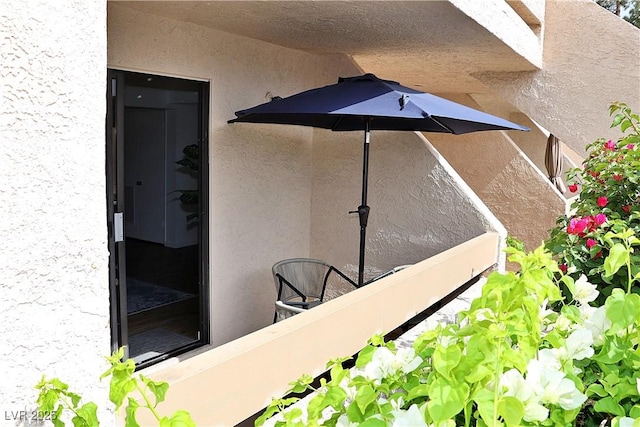 exterior space featuring stucco siding