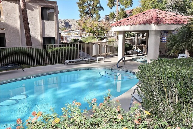 3740 Desert Marina Dr Unit 11, Laughlin, NV 89029 - community pool with a gazebo, fence, and a patio area