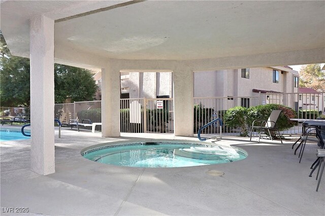 3740 Desert Marina Dr Unit 11, Laughlin, NV 89029 - view of pool featuring fence, a patio, and a swimming pool