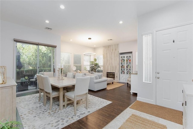 dining space with visible vents, recessed lighting, and dark wood-type flooring