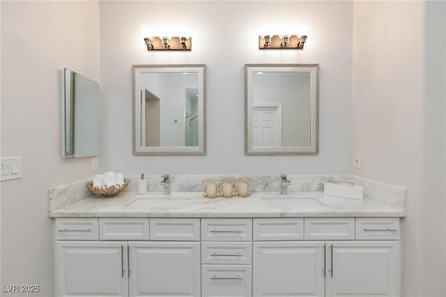 bathroom featuring double vanity and a sink