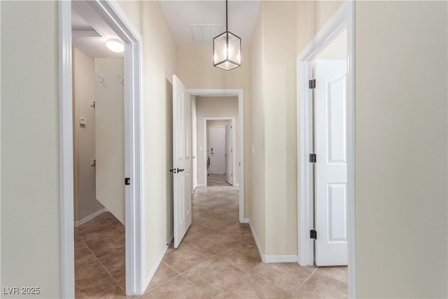 2489 Black River Falls Dr, Henderson, NV 89044 - corridor featuring baseboards and light tile patterned floors