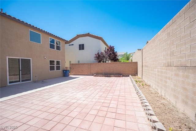 view of patio with a fenced backyard