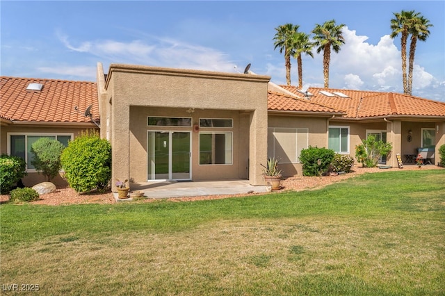 1074 Chaparral Dr, Mesquite, NV 89027 - back of house with stucco siding, a yard, a patio, and a tile roof