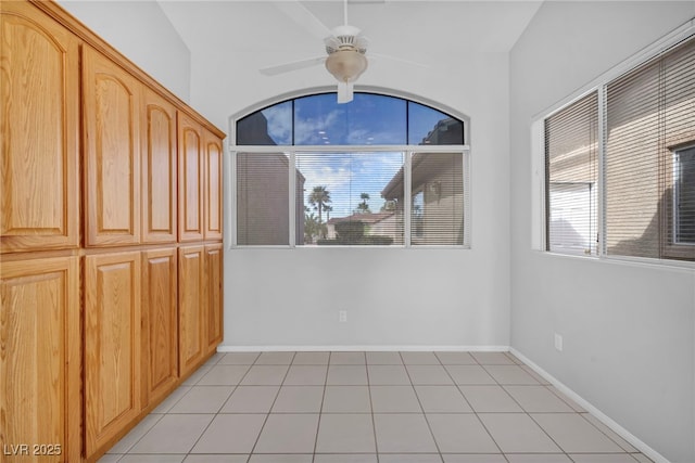 1074 Chaparral Dr, Mesquite, NV 89027 - unfurnished dining area with a ceiling fan and light tile patterned floors