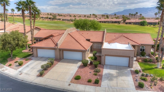 1074 Chaparral Dr, Mesquite, NV 89027 - view of front of property with stucco siding, a residential view, a tiled roof, and concrete driveway
