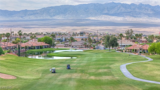 1074 Chaparral Dr, Mesquite, NV 89027 - view of community with a water and mountain view, view of golf course, a residential view, and a lawn