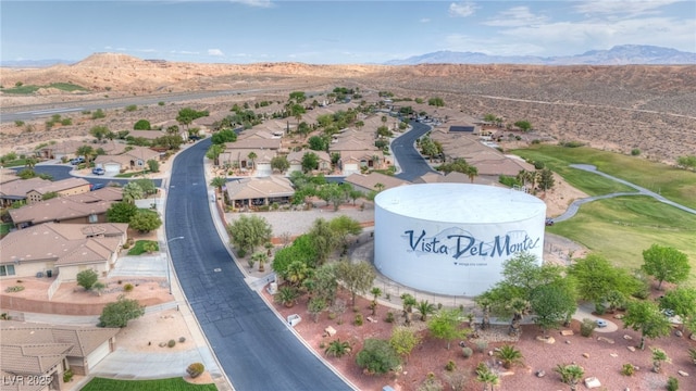 1074 Chaparral Dr, Mesquite, NV 89027 - aerial perspective of suburban area with a mountain backdrop and a desert landscape