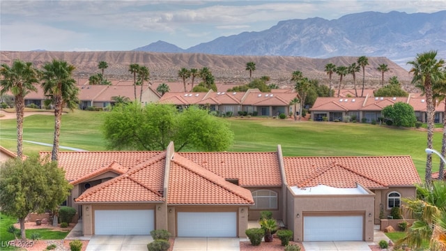 1074 Chaparral Dr, Mesquite, NV 89027 - view of mountain backdrop with a golf club and nearby suburban area