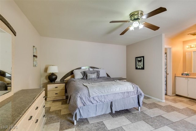 6520 Turtle Hill Rd, Las Vegas, NV 89110 - bedroom with stone finish floor and ceiling fan