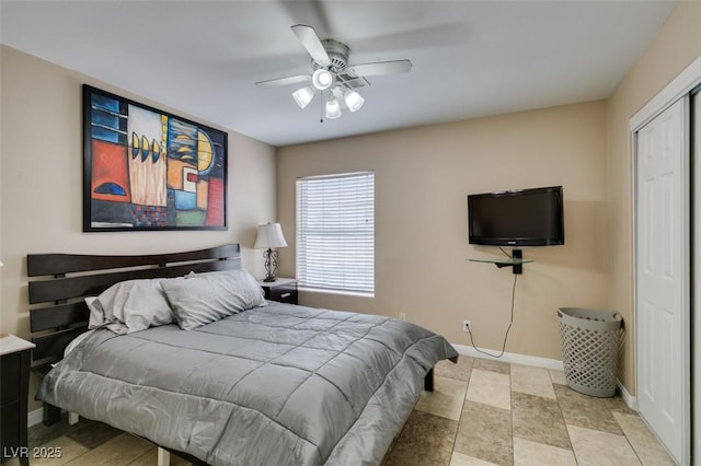 6520 Turtle Hill Rd, Las Vegas, NV 89110 - bedroom featuring ceiling fan, baseboards, and a closet