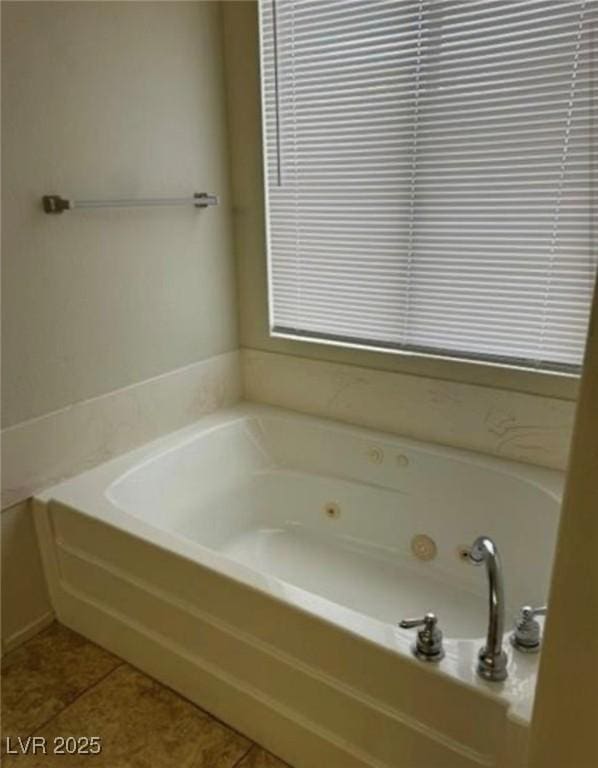 1003 Dover Glen Dr, North Las Vegas, NV 89031 - bathroom with tile patterned floors and a tub with jets
