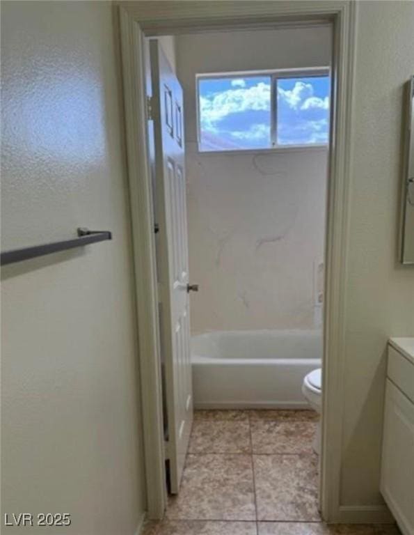 1003 Dover Glen Dr, North Las Vegas, NV 89031 - full bathroom with toilet, vanity, tile patterned floors, and shower / bath combination