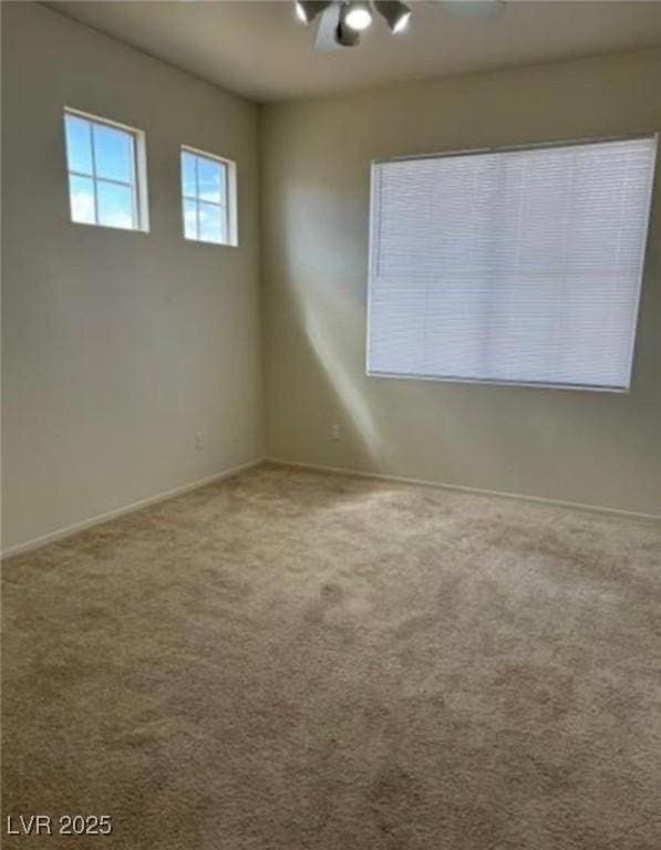1003 Dover Glen Dr, North Las Vegas, NV 89031 - empty room with carpet floors and baseboards
