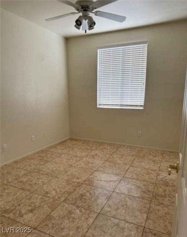 1003 Dover Glen Dr, North Las Vegas, NV 89031 - unfurnished room with ceiling fan, baseboards, and light tile patterned floors